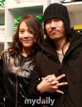 Tiger JK and Tasha Reid