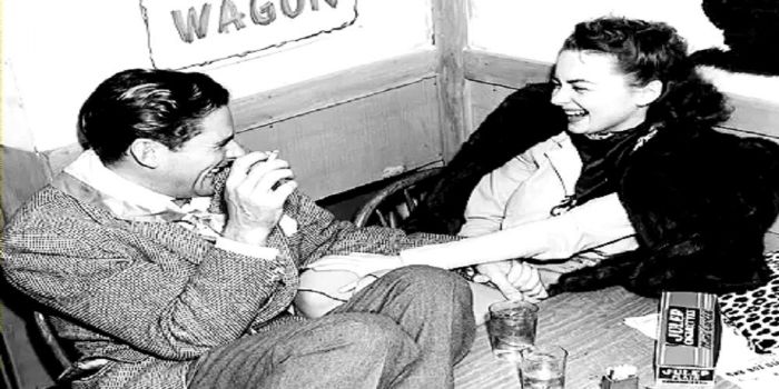 Olivia de Havilland and Errol Flynn