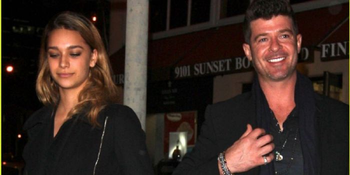 Robin Thicke and April Geary