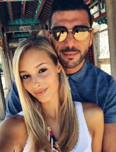 Graziano Pellè and Viktoria Varga (model)