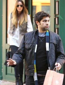 Courtney Bingham and Adrian Grenier