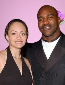 Evander Holyfield and Candi Calvana Smith