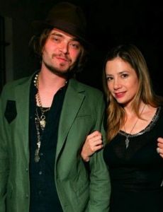 Mira Sorvino and Christopher Backus