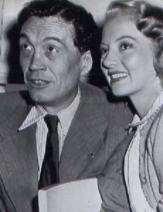 Evelyn Keyes and John Huston