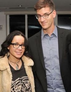 Janeane Garofalo and Brody Tate FamousFix