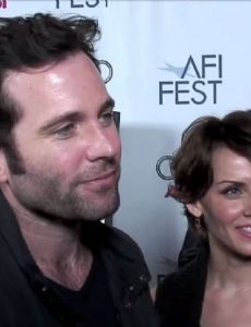 Eion Bailey and Sarah Wells