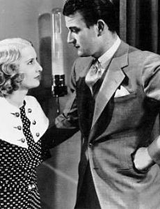Barbara Stanwyck and John Wayne