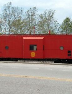 Kansas City Southern Railway Locomotive No. 73D and Caboose No. 385