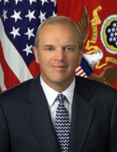 Thomas E. White
