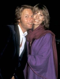 Maud Adams and Reid Smith