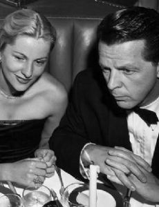 William Dozier and Joan Fontaine
