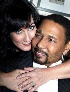 Aaron Neville and Sarah A. Friedman