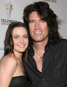 Tommy Thayer and Amber Peek